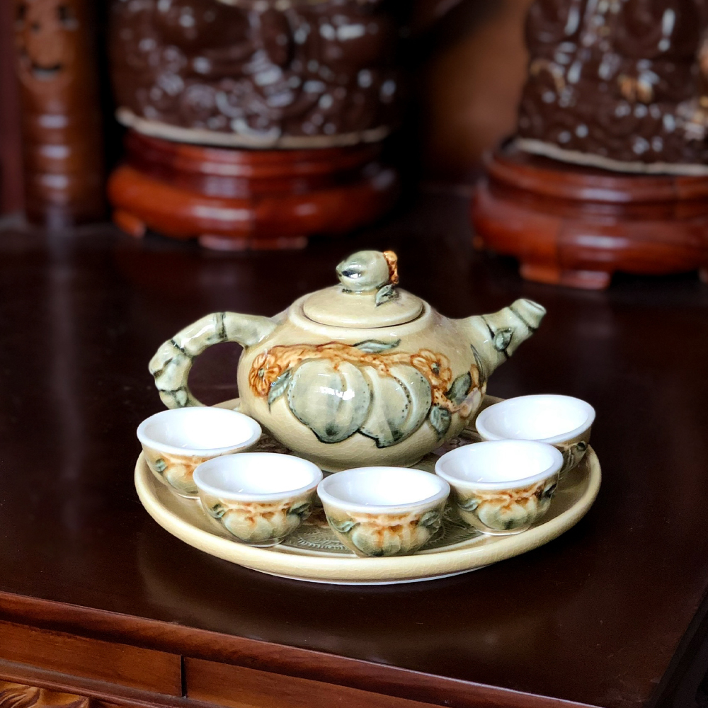 Bộ ấm chén men rạn bóng vàng đắp nổi